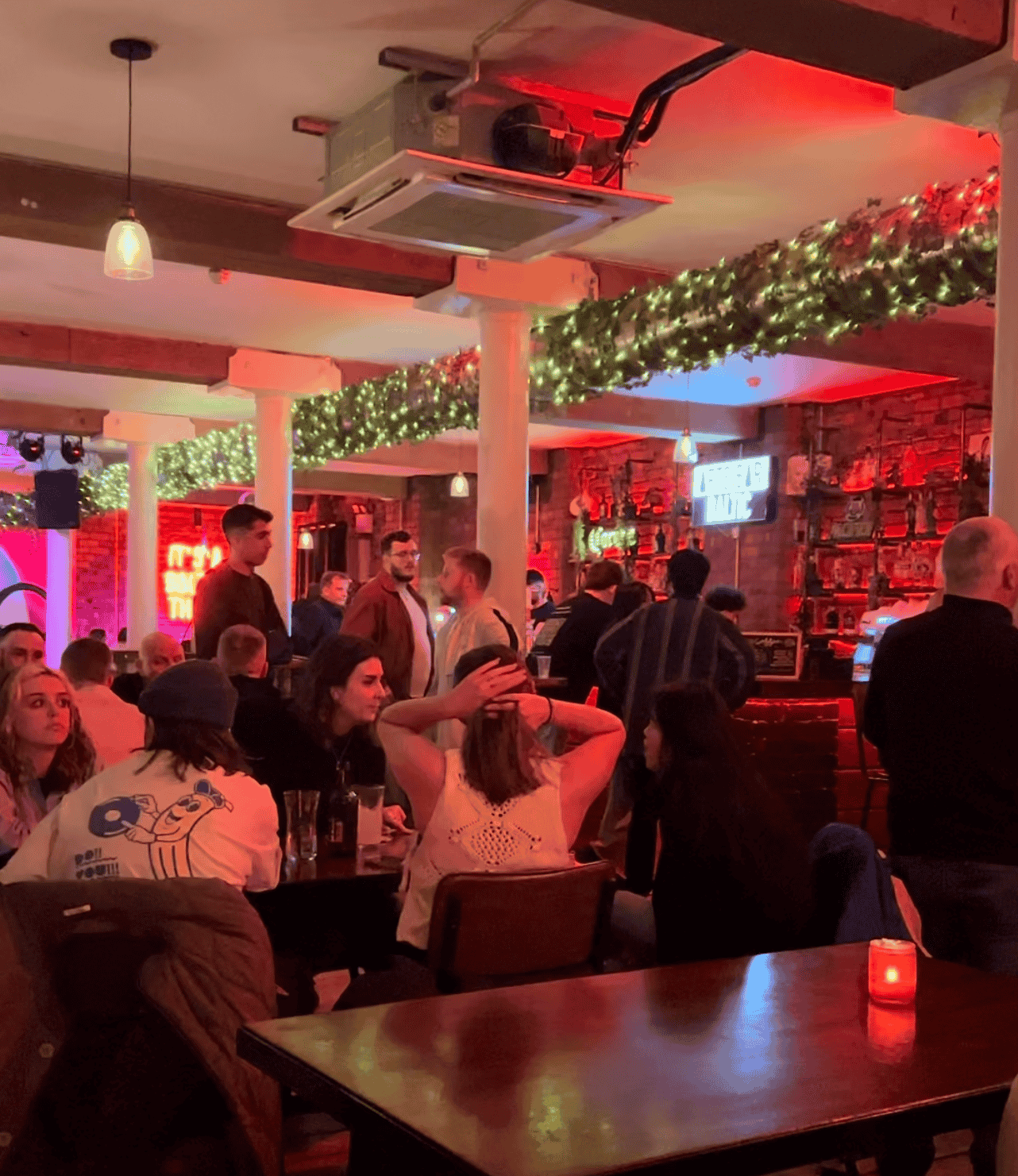 People enjoying drinks in arts bar baltic inside Elevator Studios